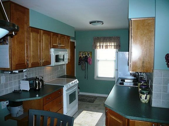 A new kitchen with built-ins, floor, counters, and more.