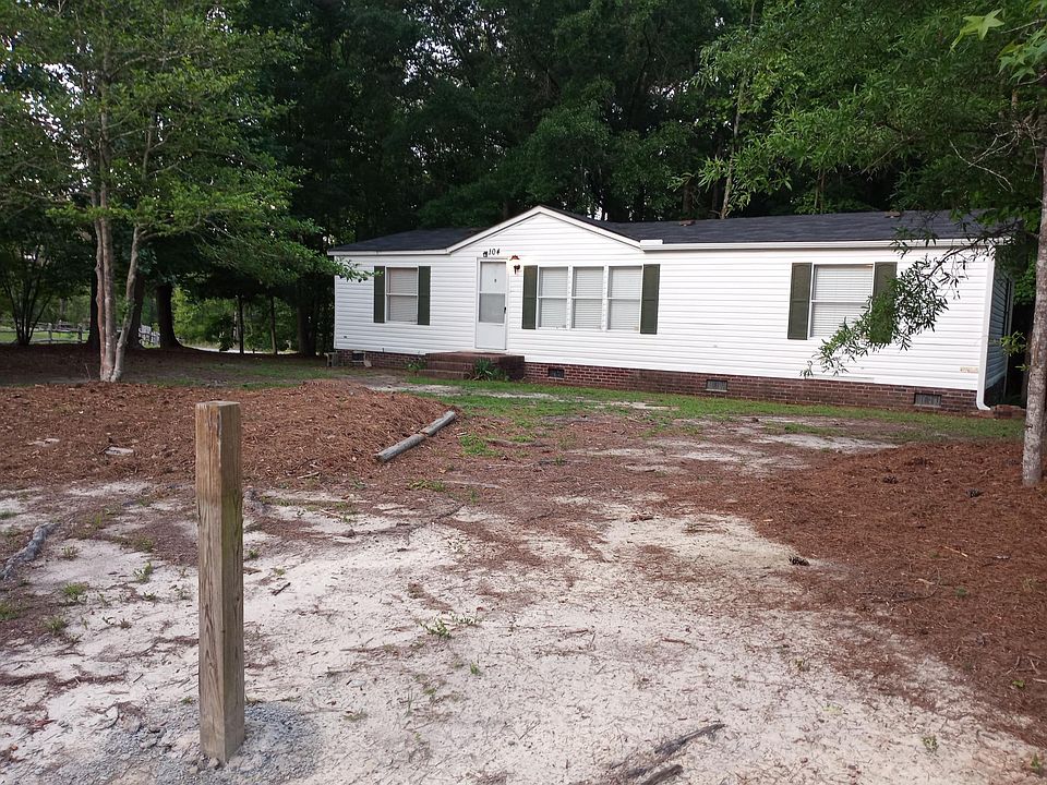 very private yard with lots of trees , yard service included in the rent along with trash service and water and sewer