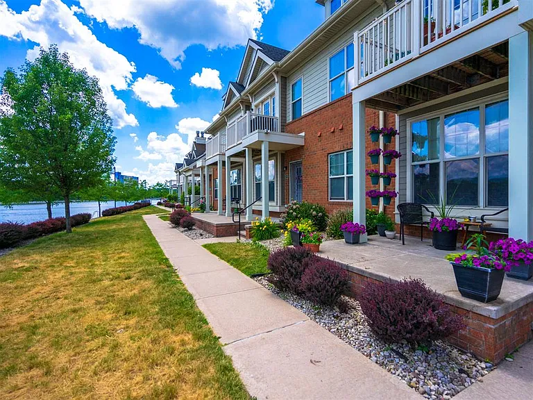 Close up view of private porch with view view of lawn overlooking the Genesee River