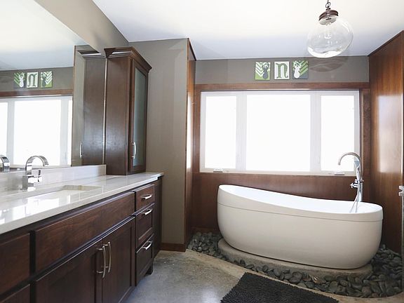 Spa-like master bath with incredible tub and ample storage