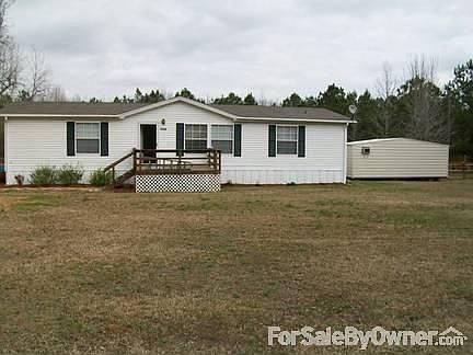 Front of House showing 12x24 shed