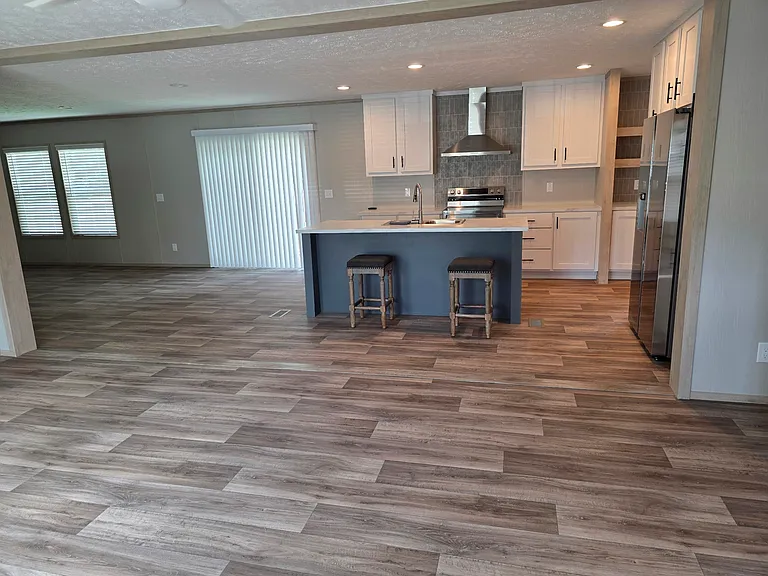 Brand new kitchen. All new, stainless steel major appliances included! New full sized washer & dryer included as well.