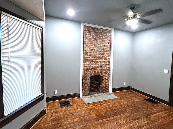 Another angle of the bedroom and fireplace