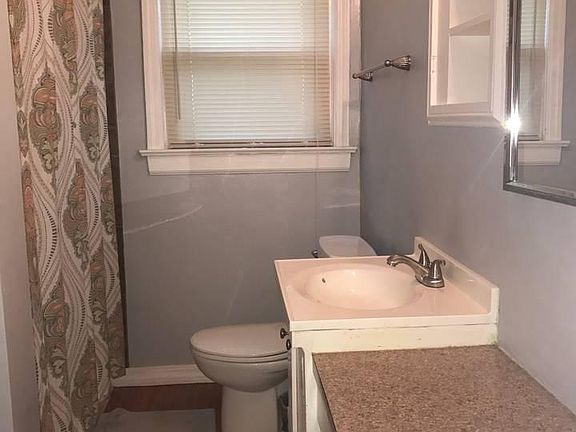 Bathroom has Double Vanity Sinks 