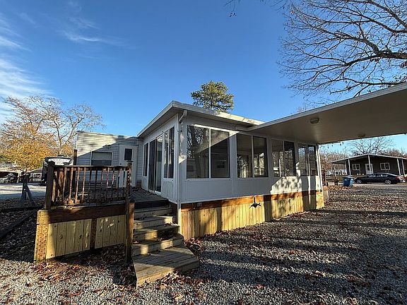 Carport and 2 parking spaces