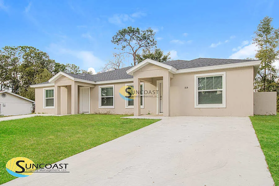 Modern 2 Bed 2 Bath Duplex | Lawn Care Included — Photo 2
