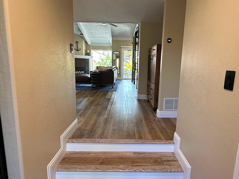 Entryway, kitchen to the left, hall closet to the right, bathroom just passed that to the right