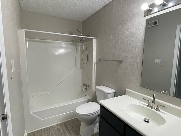 Brand new shower and sink fixtures, brand new toilet, updated cabinet, all new hardware and luxury vinyl floors