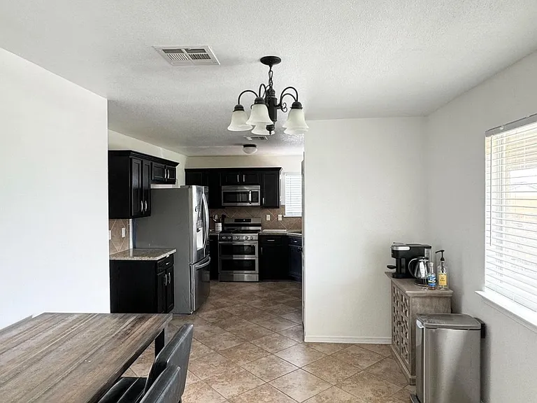 12808 Luis Cortinas — Photo 2