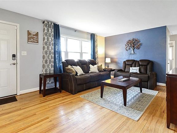 Original hardwood floors in living room and three bedrooms.