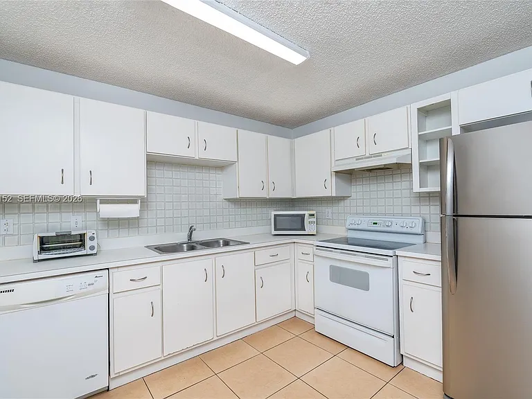 3877 NW 122nd Ter #1-L — Photo 7