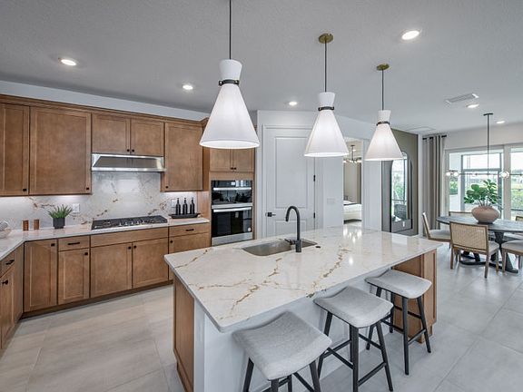 Designer Kitchen Overlooking Gathering Room