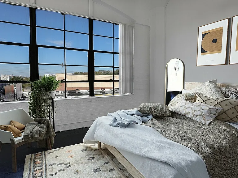 Factory window Bedroom With Tan bedding