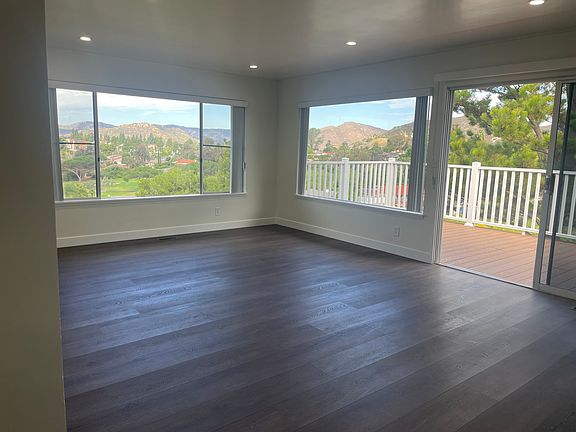 Living Room with patio door leading to deck