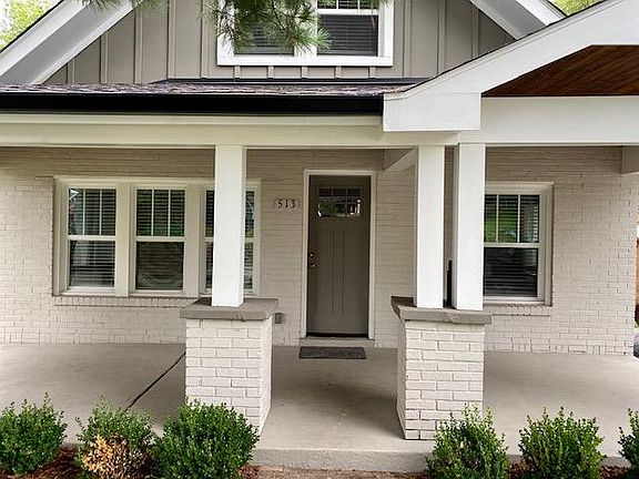 A spacious porch on a quiet street provides the perfect spot to enjoy the neighborhood.