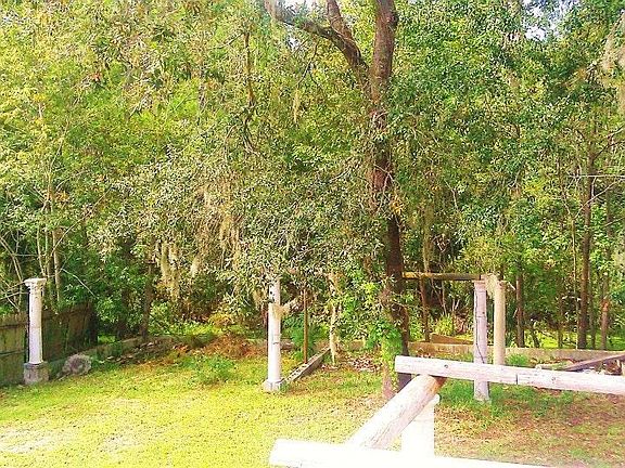Upstairs balcony off the eat in kitchen area. Plenty of room for a bistro set to enjoy morning coffee or study outside overlooking the huge preserve lot.