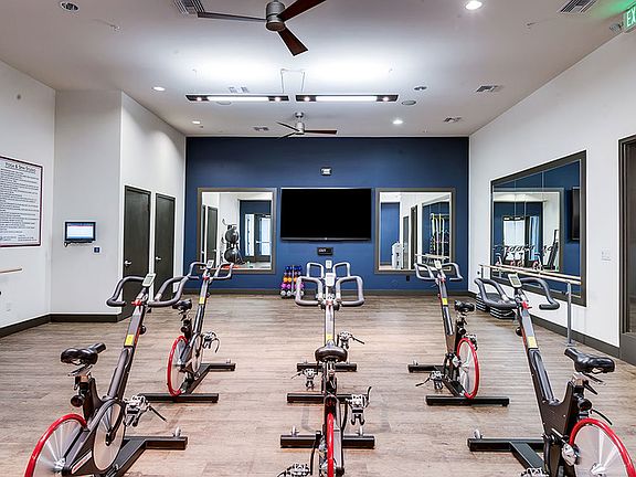 Yoga room & spin studio with fitness classes on demand