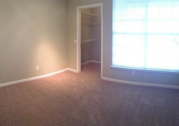 The bedrooms have plush carpet and beautiful double payne wi