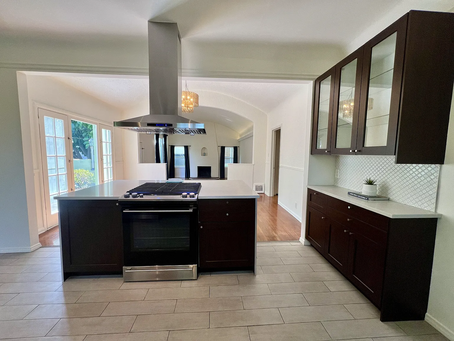 Kitchen view into dining and living areas