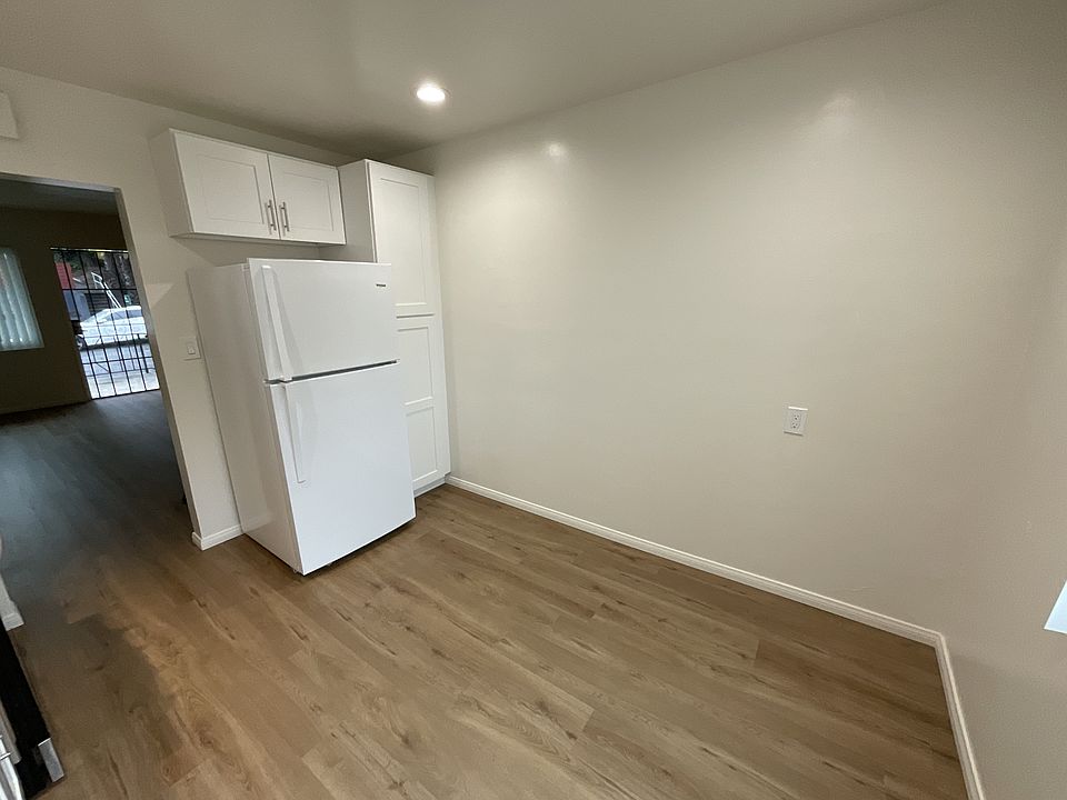 Refrigerator and pantry. Room for a kitchen table.