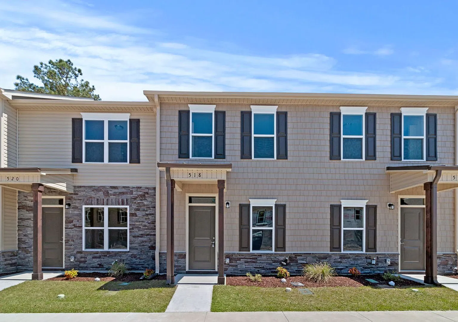 Stylish End Unit with Fenced Outdoor Space — Photo 1