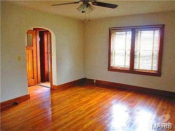 Another view of living room and front entrance.