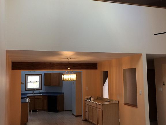 Kitchen, dining area and 2nd floor loft as viewed from the living room