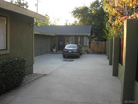 Looking up driveway towards rear unit