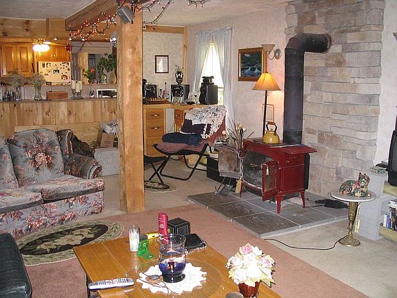 Large open livingroom with wood stove
