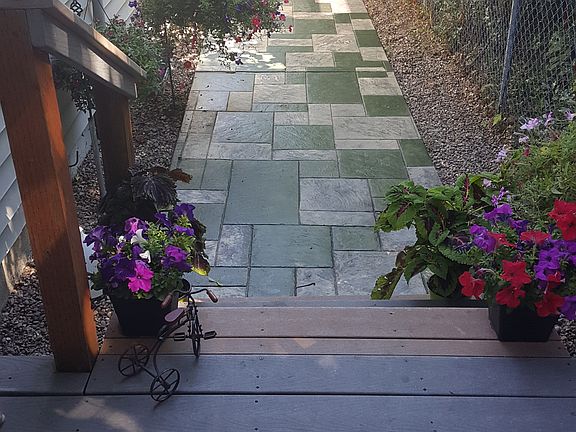 View of porch and stamped concrete