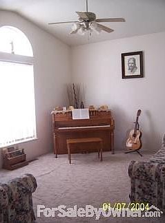 Formal receiving room
						:
						Front door enters this beautiful secluded formal living room.