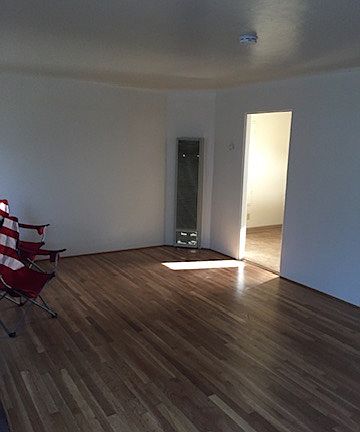 Living room from front door, kitchen entrance