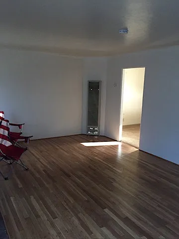 Living room from front door, kitchen entrance