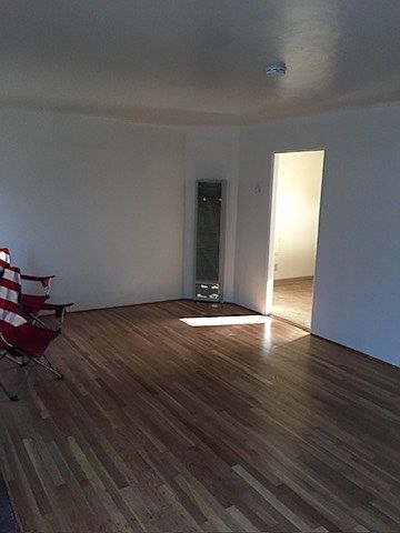 Living room from front door, kitchen entrance