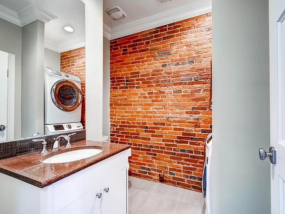 Half Bath with full sized washer dryer