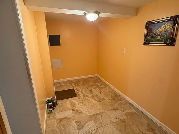 5th image of 9324 201st St Floor Basement