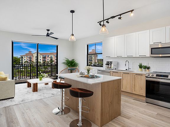 Your new home features spacious kitchens with brand-new stainless steel appliances.