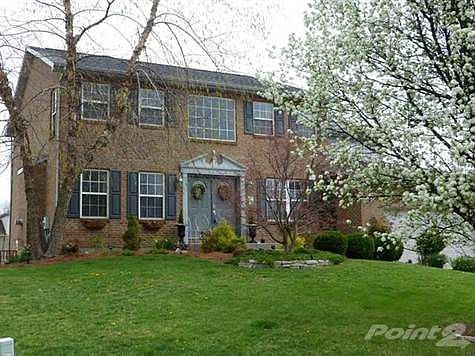 Finished with lower level with walk out to large patio, Gazebo and beautiful lake. Great entertainin