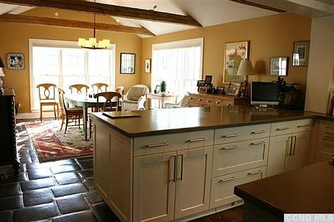 Great Room with Bronze Tone Mexican Tile Floors