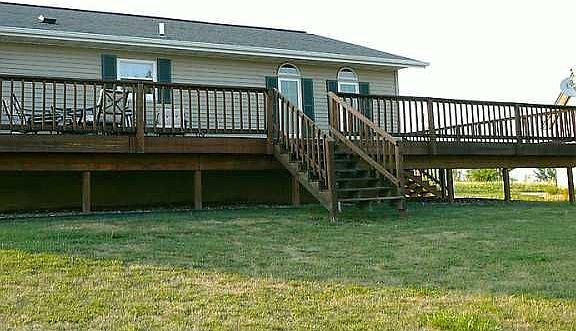 Deck on back of home