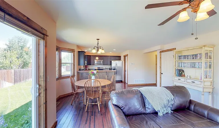 Open concept living area flows nicely into the dining and kitchen area.