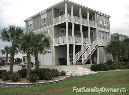 front of home
						:
						street view with view of rolldown storm shutters and landscaping