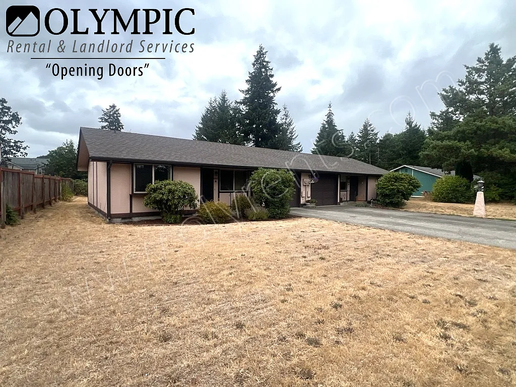 2 Bedroom, 1 Bath Single-Level Duplex with Garage & Spacious Yard — Photo 2