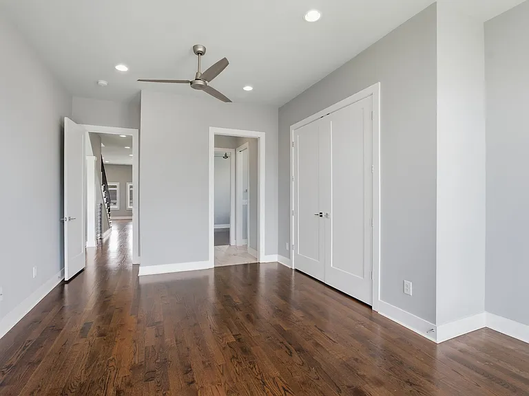 Guest bedroom has a door to the jack and jill bathroom