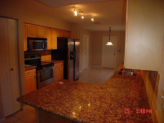 remodeled kitchen eating area in background