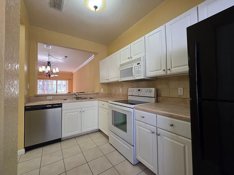 5065 NW 45th Rd #103 — Photo 6