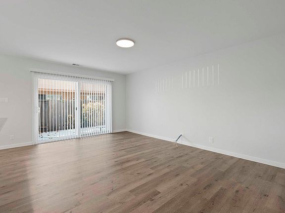 Living room with sliding door to outside patio