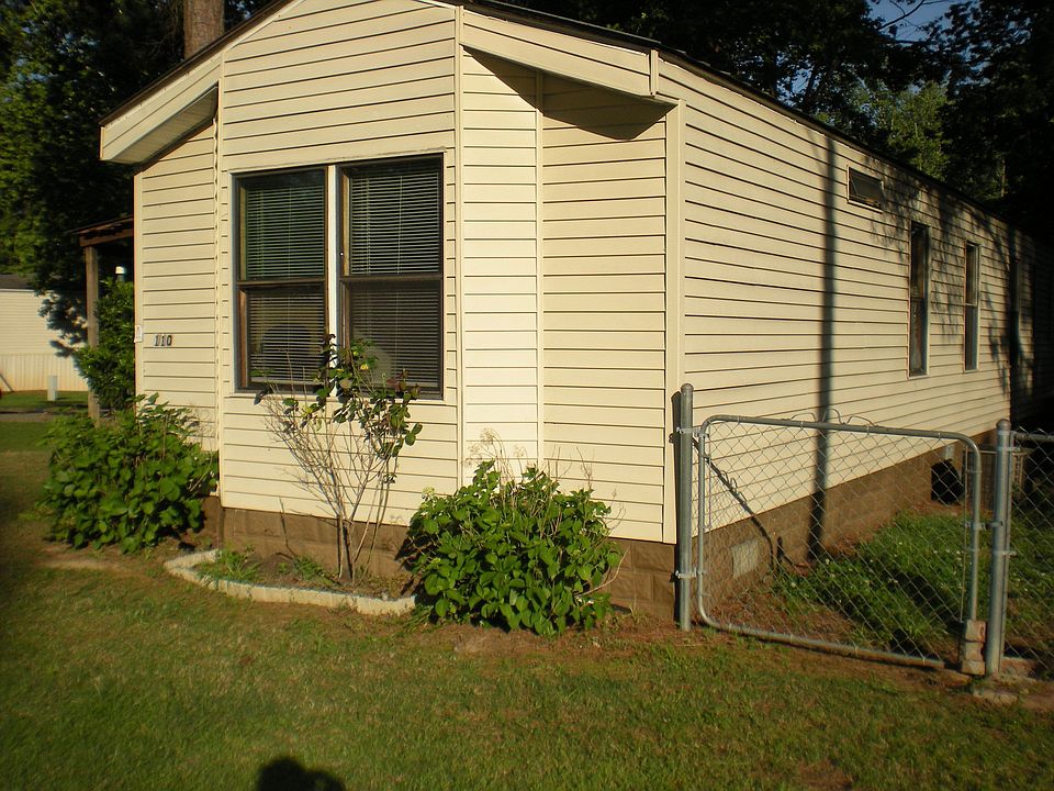 Front view from street with beautiful hydrangeas and roses