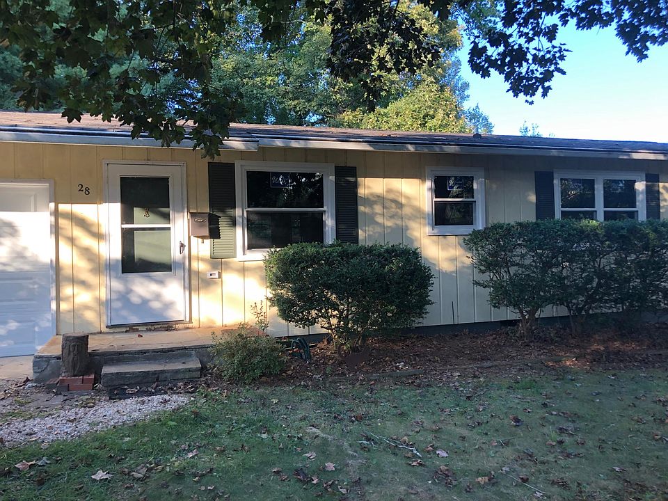 Front elevation with new windows.