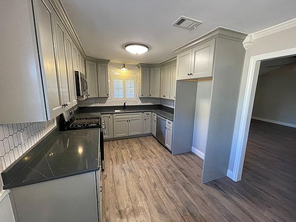 Granite countertops with tile backsplash